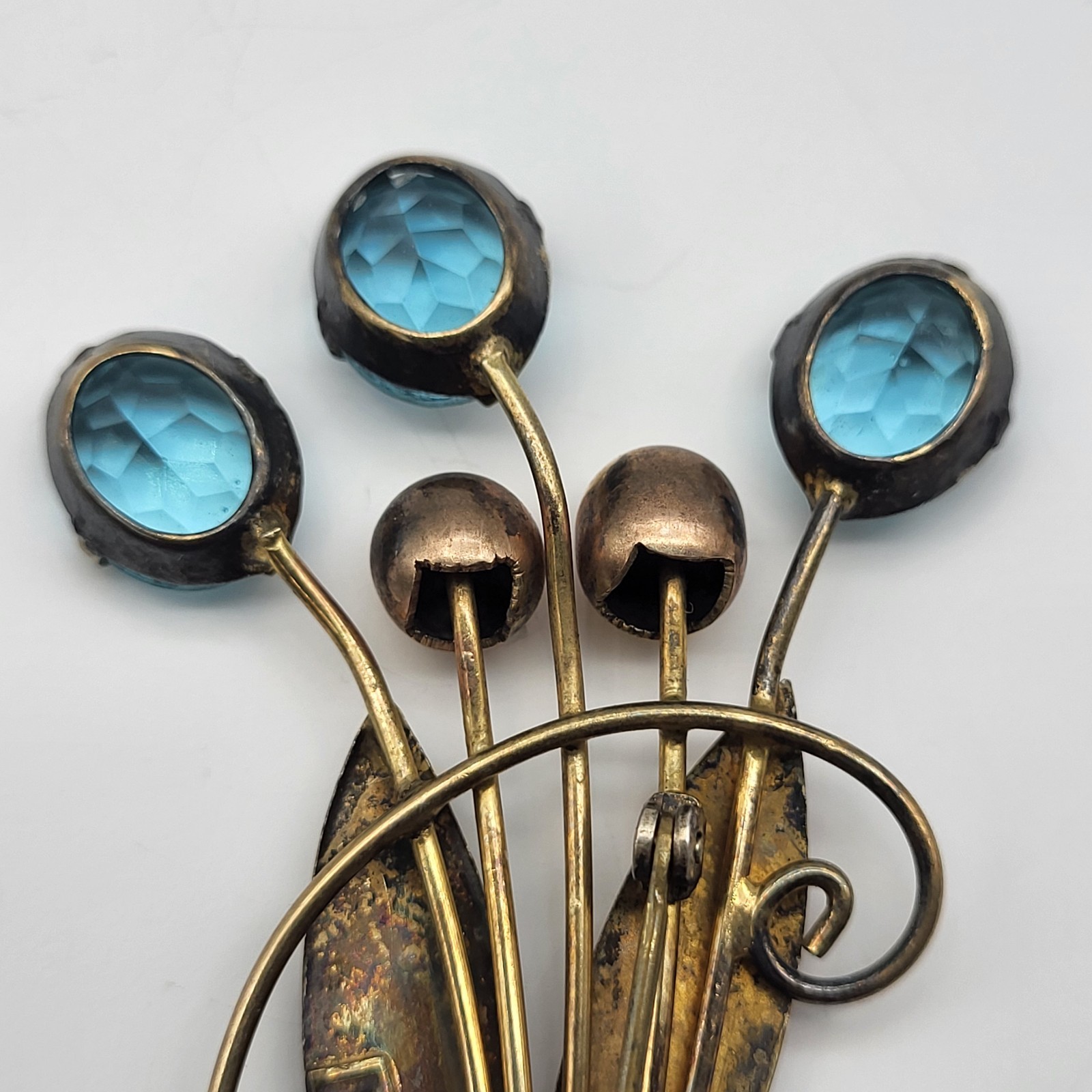 VTG 1/20th 12K gold filled Aqua Blue rhinestone cattail frond brooch pin Patina