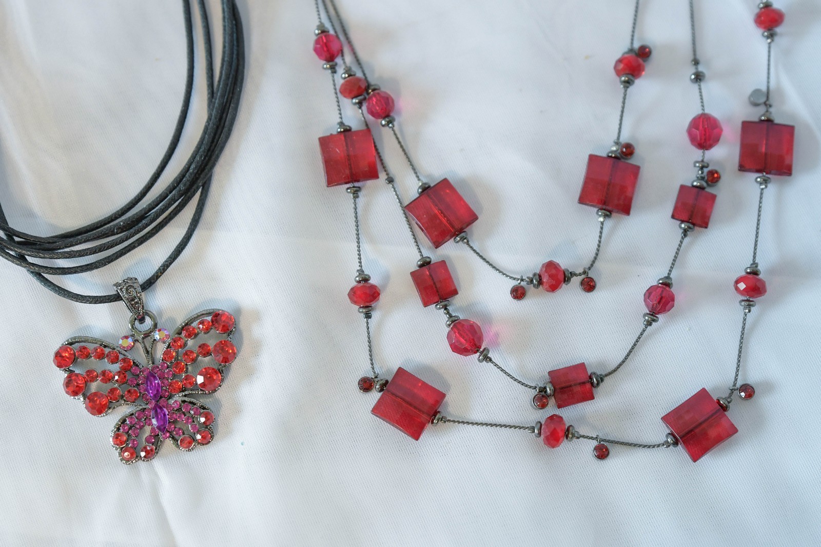 Set of 2 Vintage 90’s necklaces faceted red bead necklace and butterfly pendant