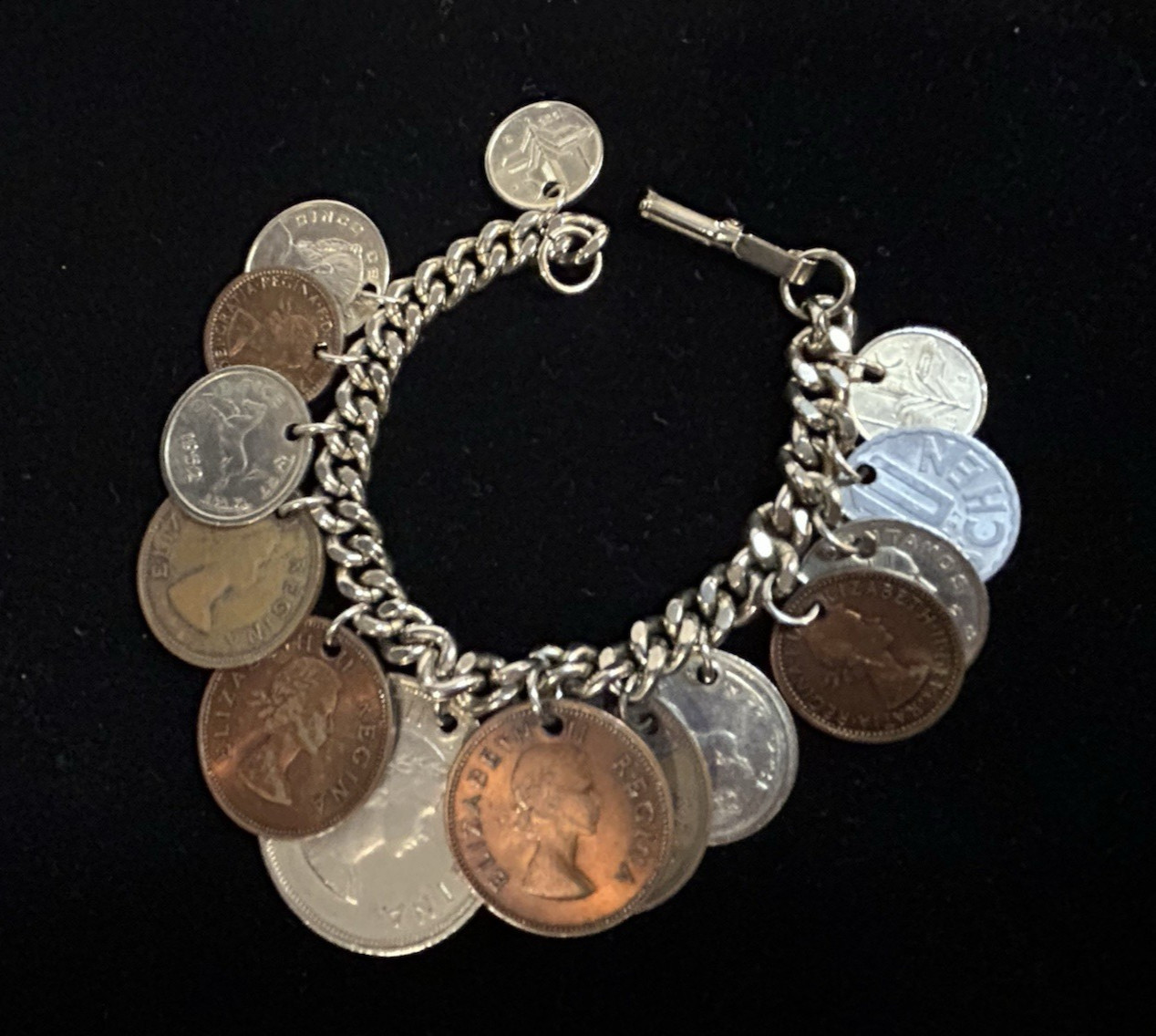 SALE 30% OFF. Vintage 1950’s International 14 Coins Charm Chain Link Bracelet 7″