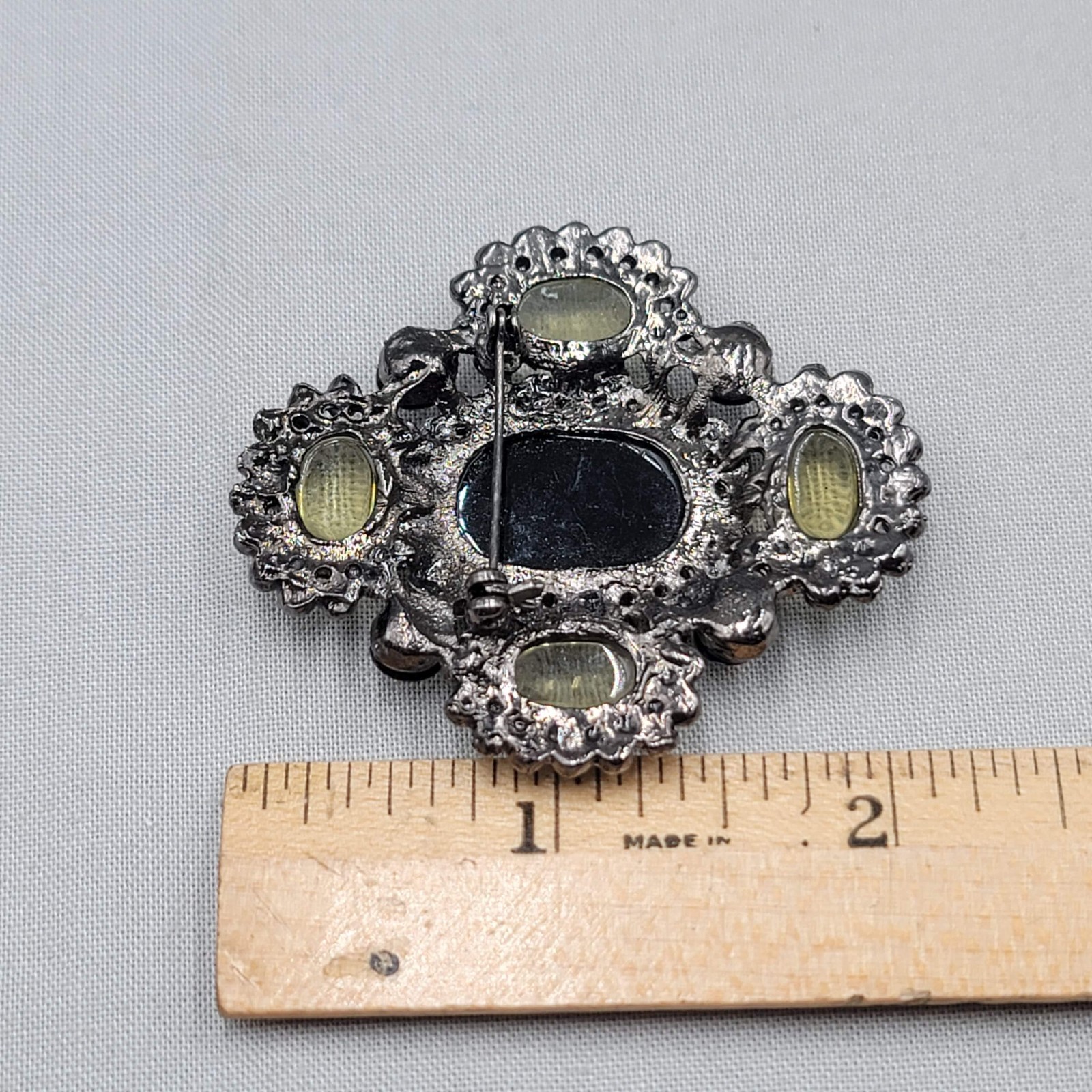 Vintage Yellow Cabochon Brooch Rhinestone Black Metal 2 1/8″