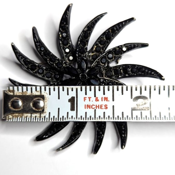 Vintage Mourning Brooch Black Rhinestone Japanned Pinwheel Signed Unreadable