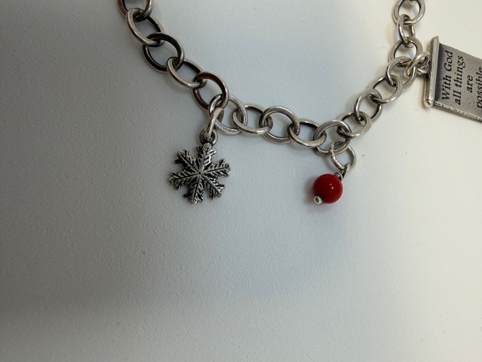 James Avery Sterling silver Charm bracelet with 6 Charms 7.5 Inch. 18+ Grams.