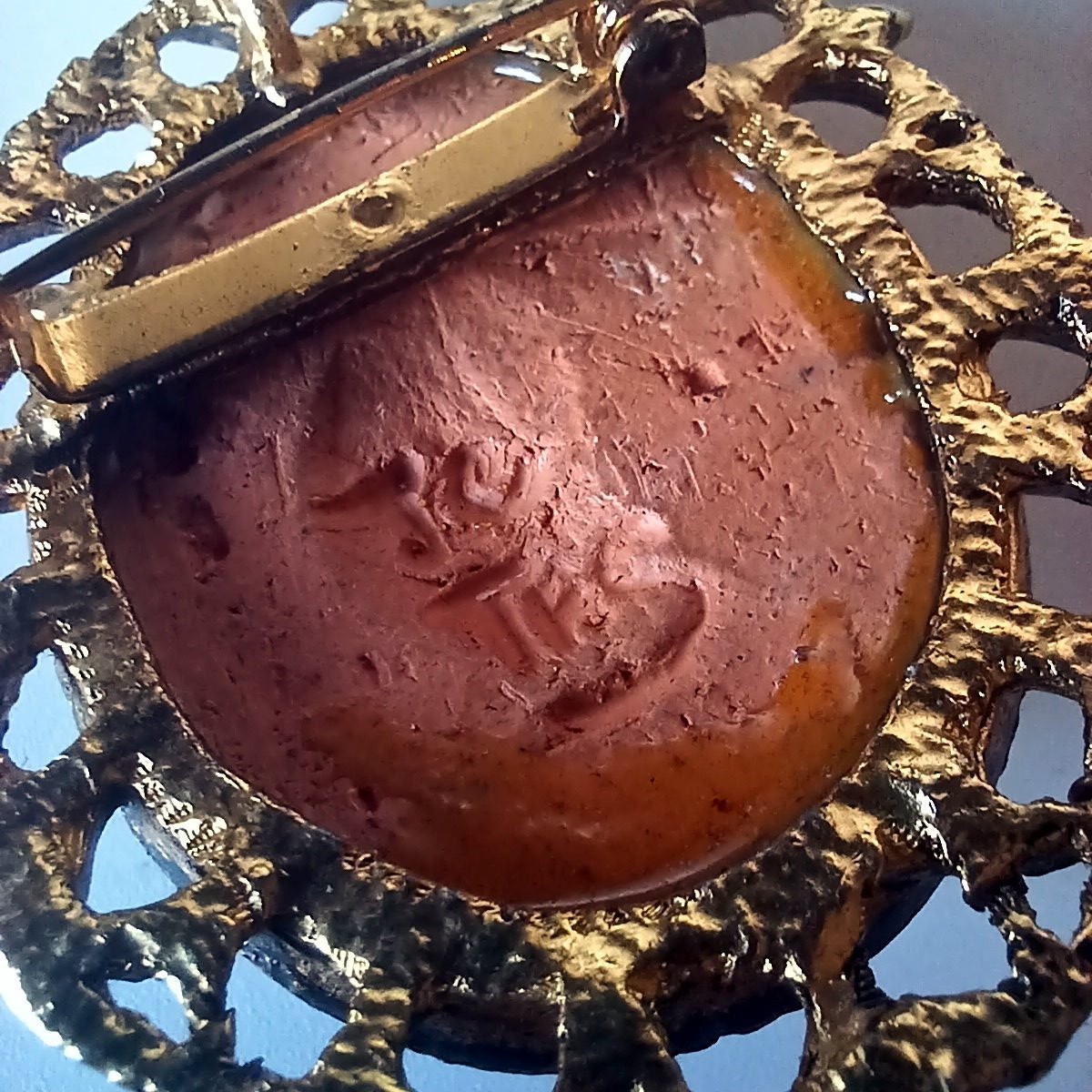 Vintage Signed Brooch: Carved Clay African Face in Ornate Gold-tone Frame
