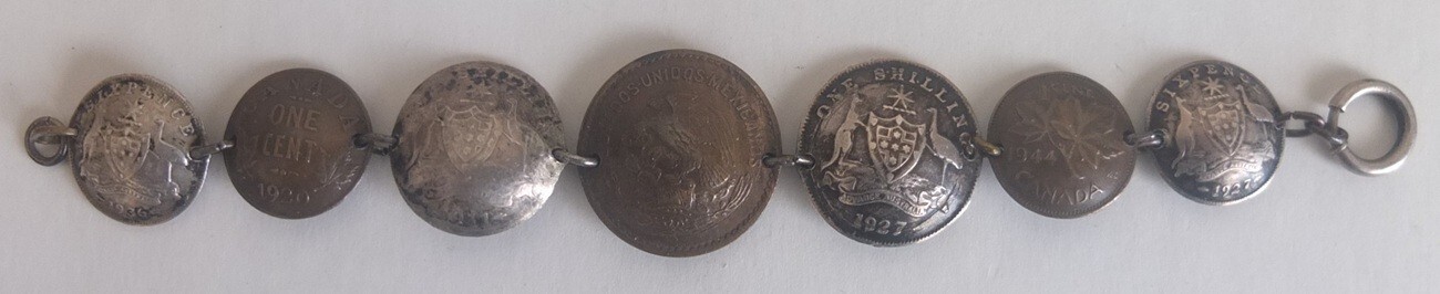 vintage folk art bracelet—coins from 1911 to 1945—four are Australia .925 silver