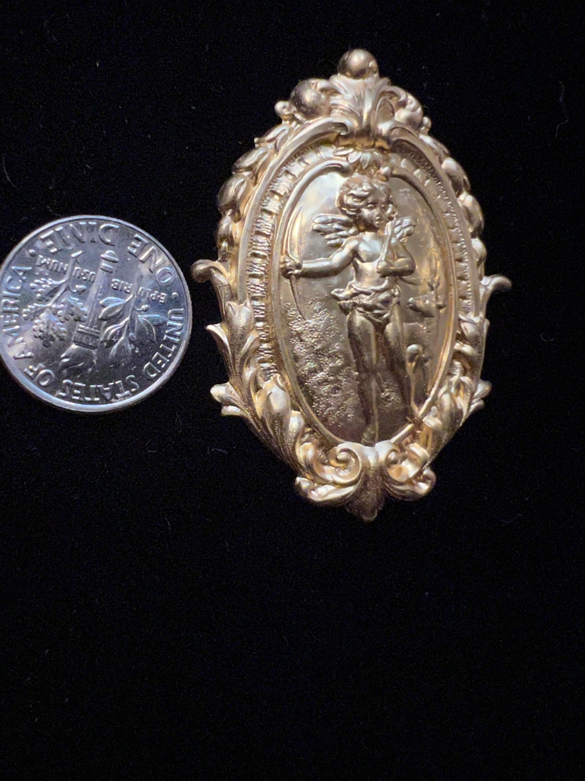 Vintage brass stamping. Cherub design. Victorian Antique from famous manufacture