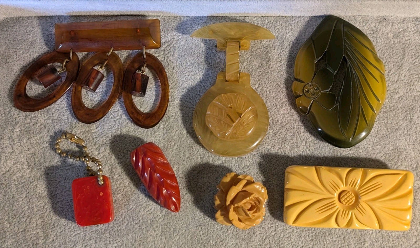 7 Vintage Bakelite Large Carved Pins, etc. Great colors, hand carved!