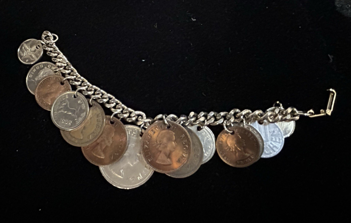 SALE 30% OFF. Vintage 1950’s International 14 Coins Charm Chain Link Bracelet 7″