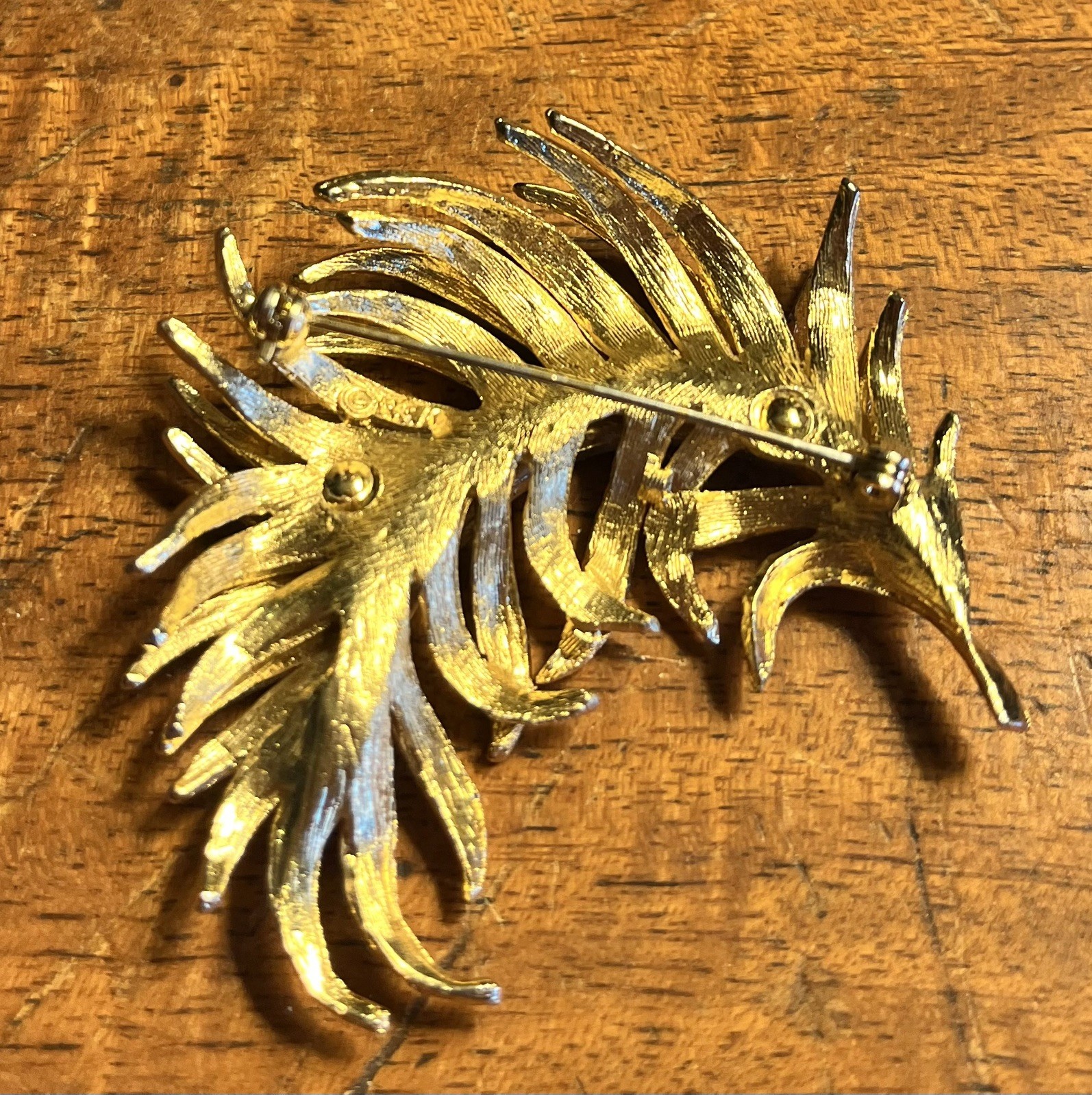 9 Vintage Signed Gold Toned Brooches (Coro, Kramer, Tifari)