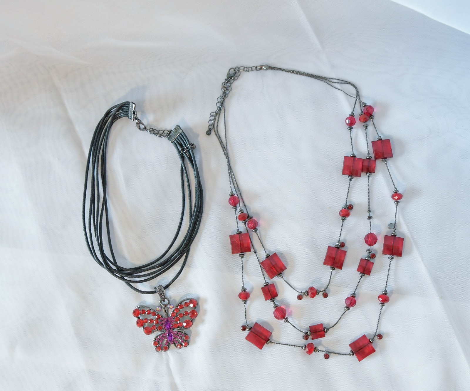 Set of 2 Vintage 90’s necklaces faceted red bead necklace and butterfly pendant