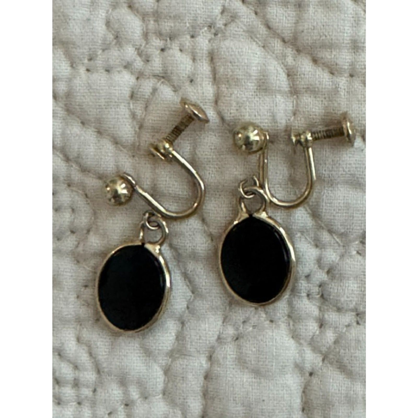 Vintage 1940-1950s Gold filled screw back earrings with black stone.