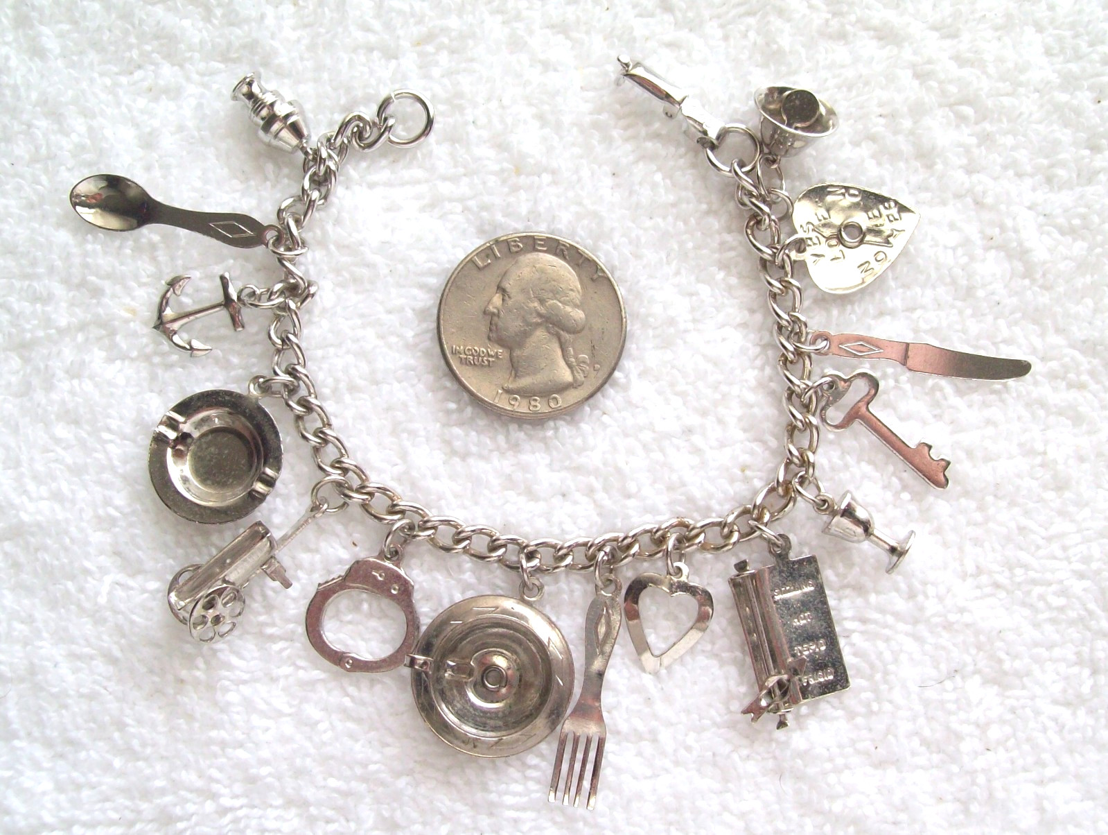 Vintage Coro Bright Silver-Tone Charm Bracelet with 15 Charms