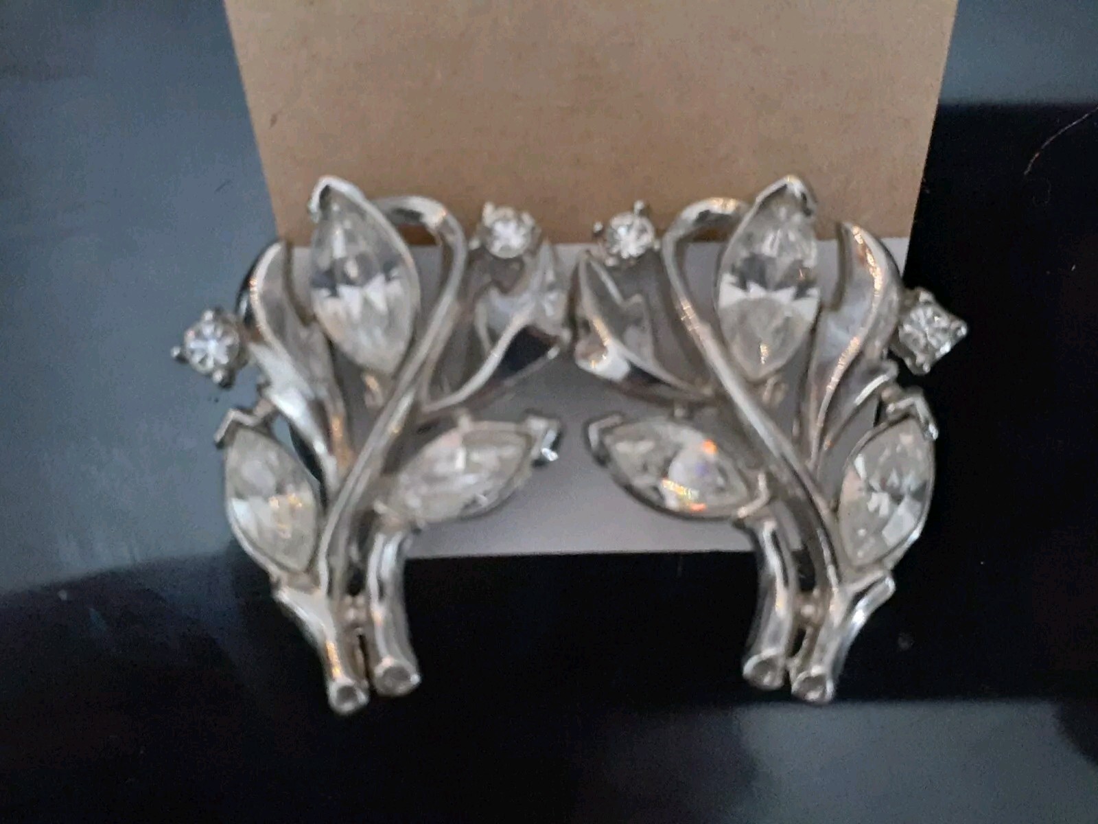 Vintage Crown Trifari rhodium plated marquise cut rhinestone clip on earrings
