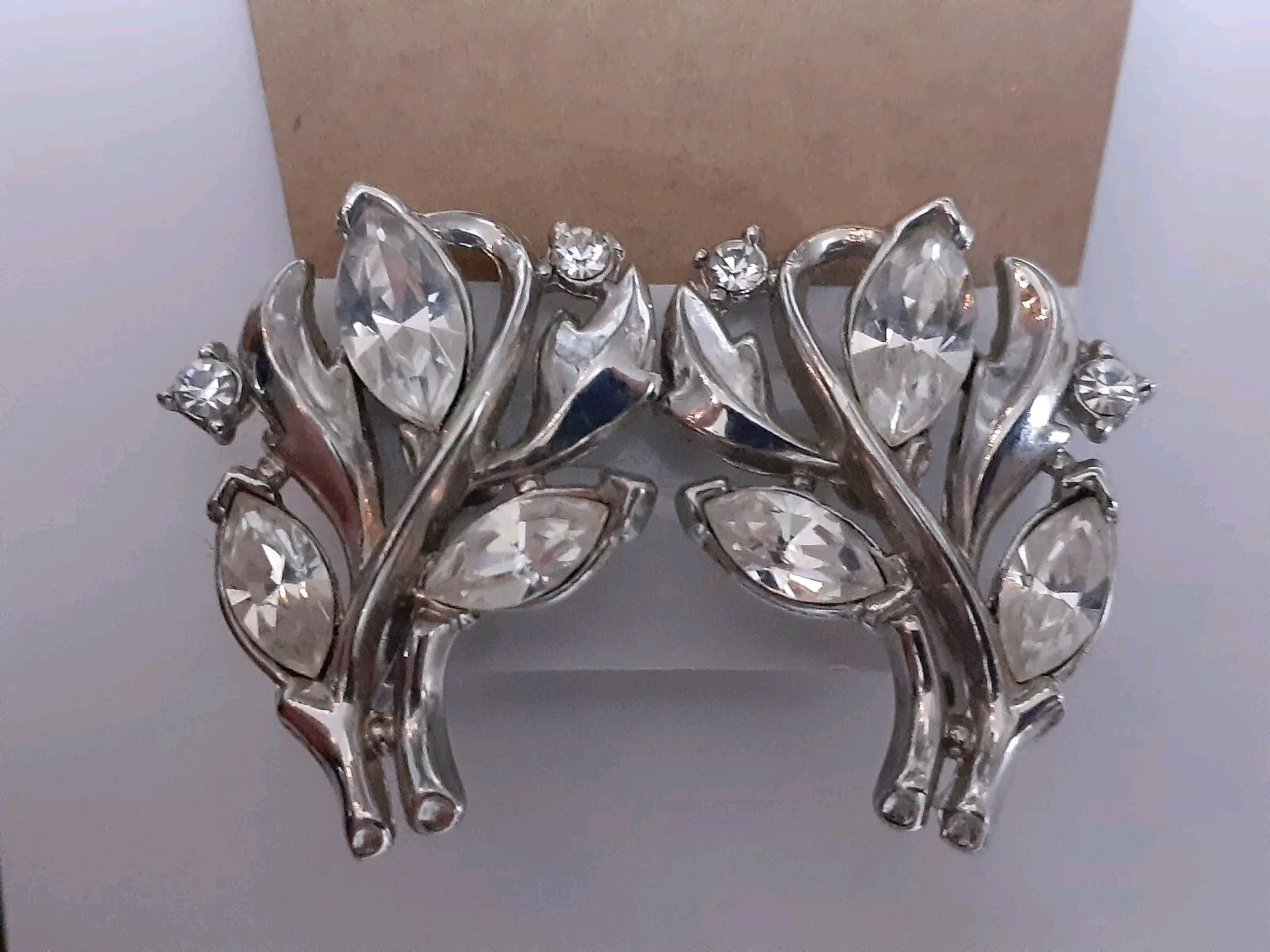 Vintage Crown Trifari rhodium plated marquise cut rhinestone clip on earrings