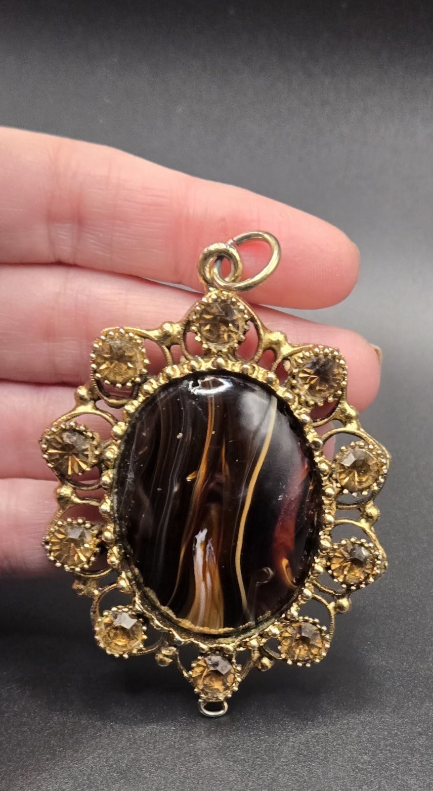 Vintage Ornate Gold Tone Oval Pendant Brown Black Stone Decorative Accents