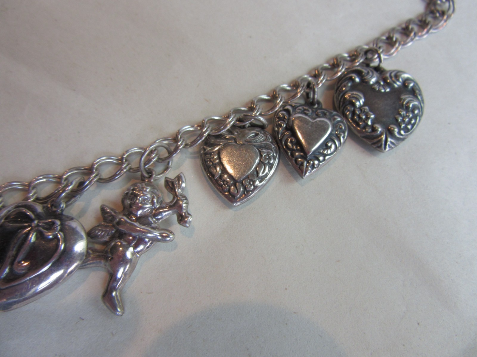 Vintage double link chain necklace with 22 heart, love themed charms 61.8 grams