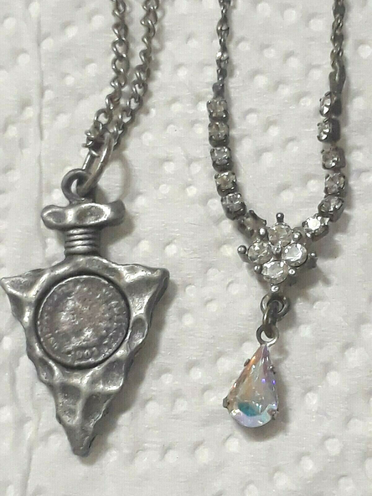 Lot of silver tone chain necklaces with rhinestone pendants. Coin, Love + Luck