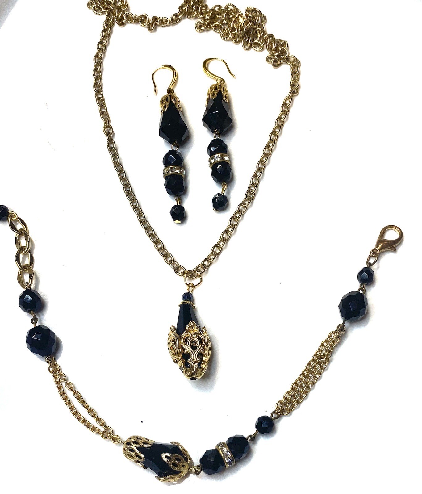2.476 Vintage set, pendant, bracelet, earrings. gold tone, cut glass inserts