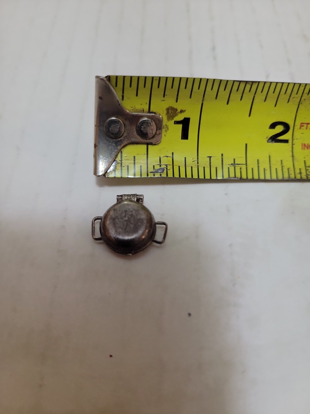 Vintage movable waffle iron sterling charm.