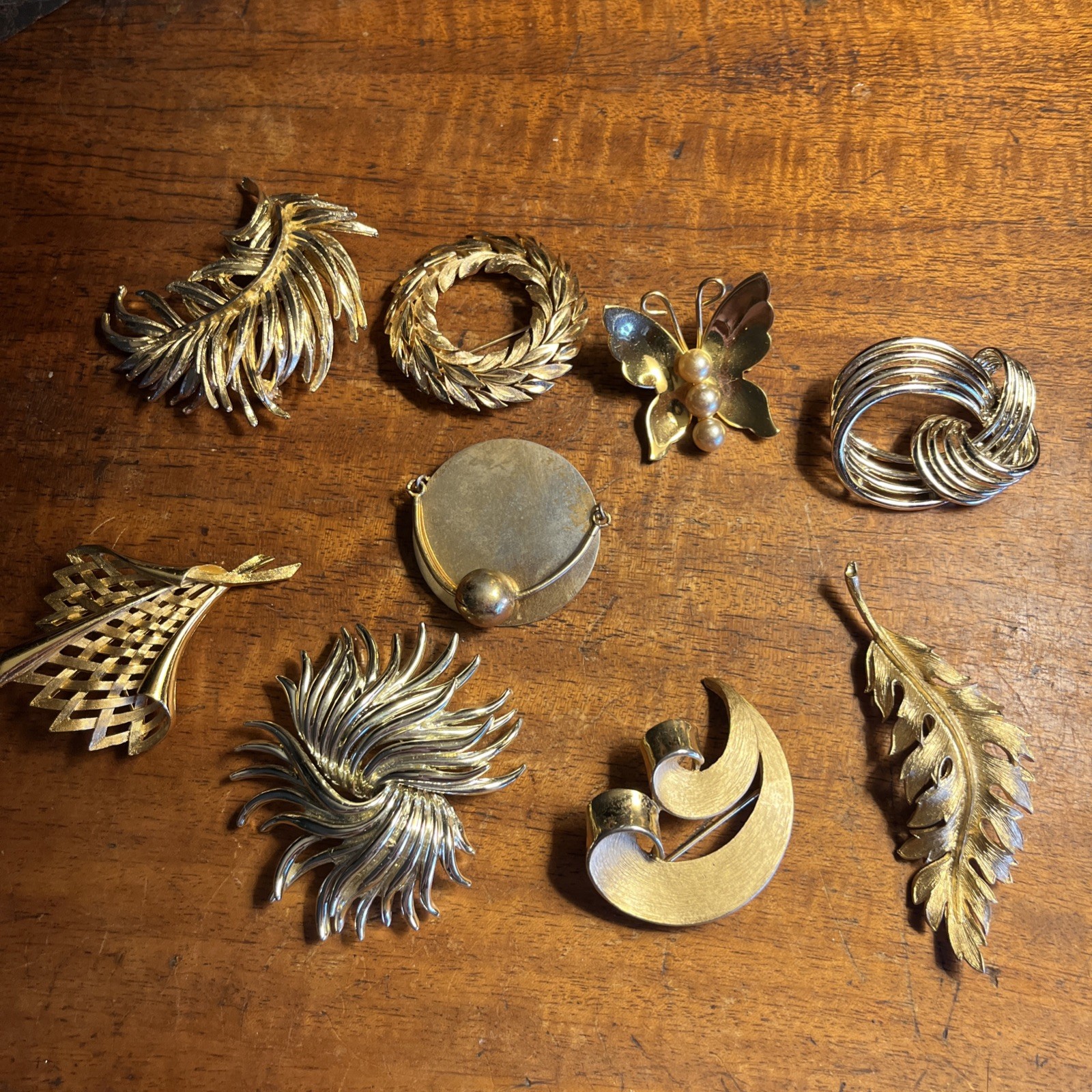 9 Vintage Signed Gold Toned Brooches (Coro, Kramer, Tifari)