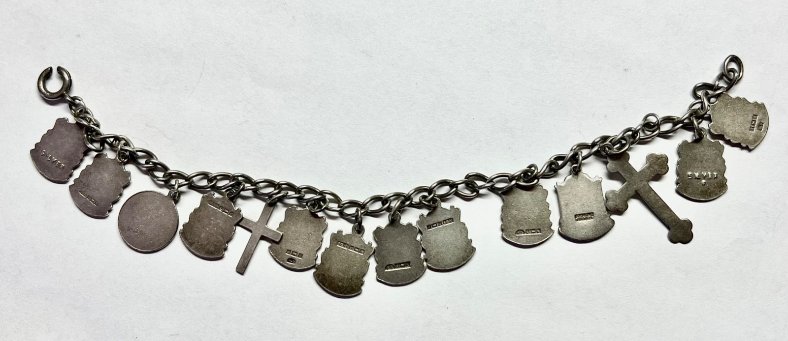 Vintage sterling charm bracelet w/ 14 silver & enameled charms – United Kingdom