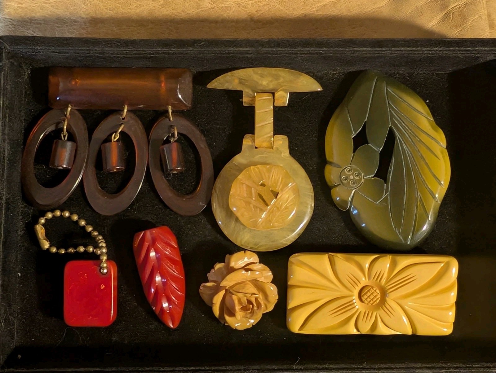 7 Vintage Bakelite Large Carved Pins, etc. Great colors, hand carved!
