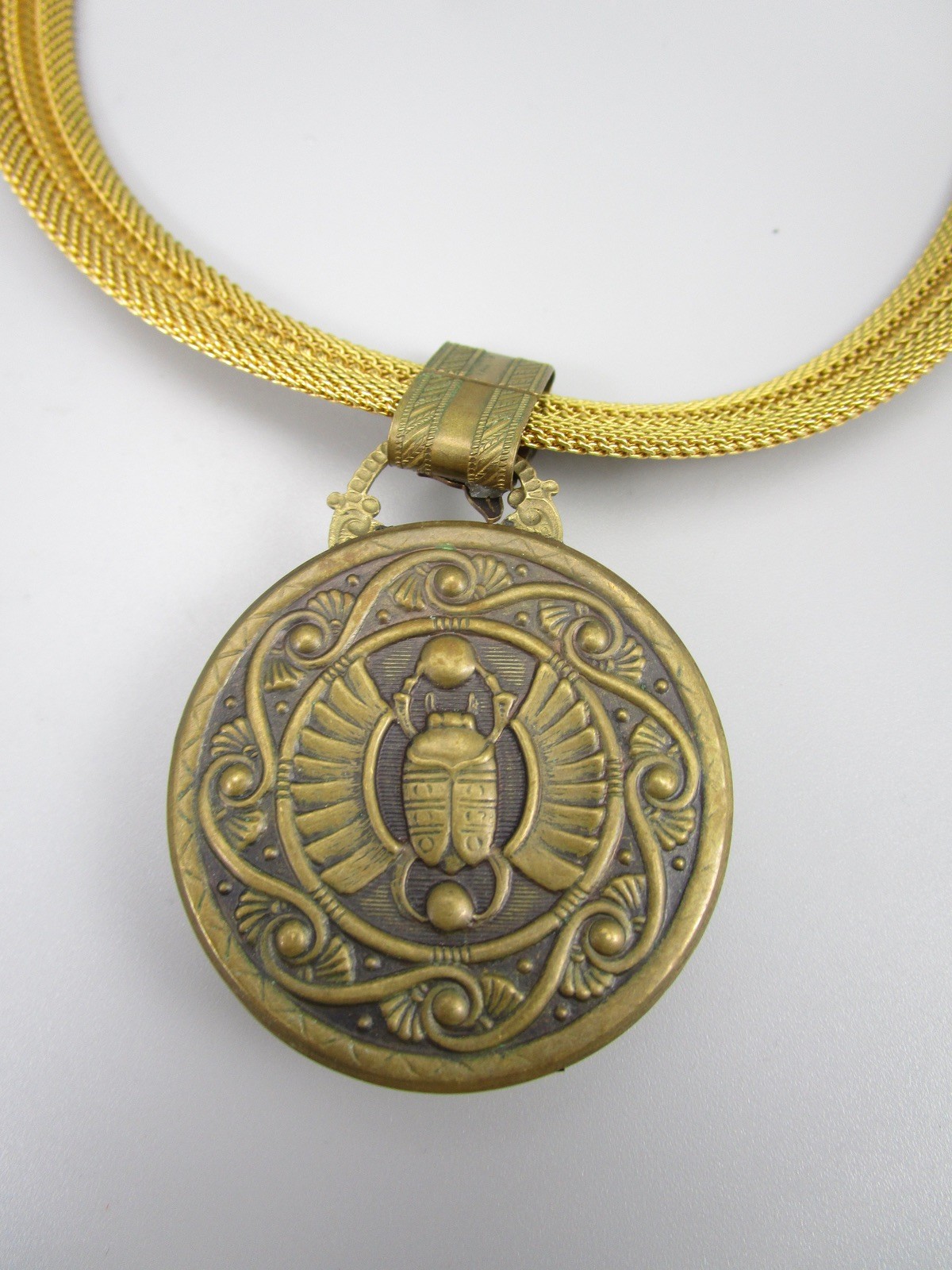 LOVELY PATRICE BRASS RESIN &  SHELL SAND DOLLAR DOLPHIN STATEMENT NECKLAC
