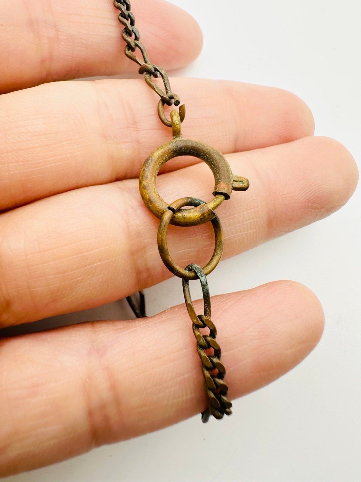 Vintage unsigned brass glass rhinestone charm Necklace 24.5”