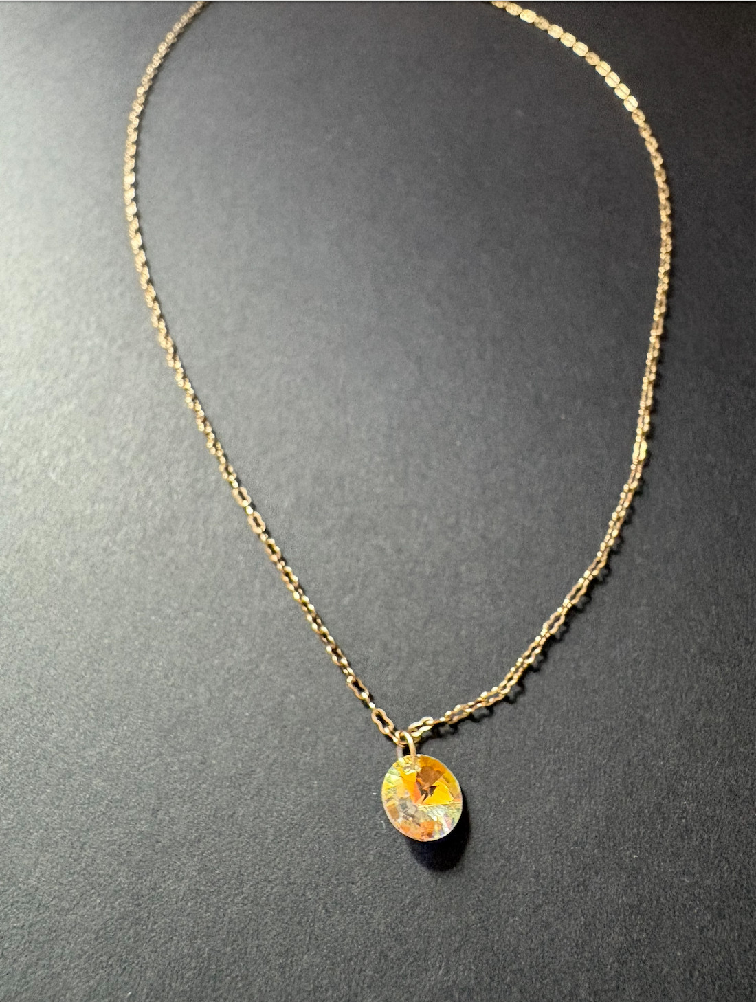 Swarovksi necklace with iridescent pendant on gold chain