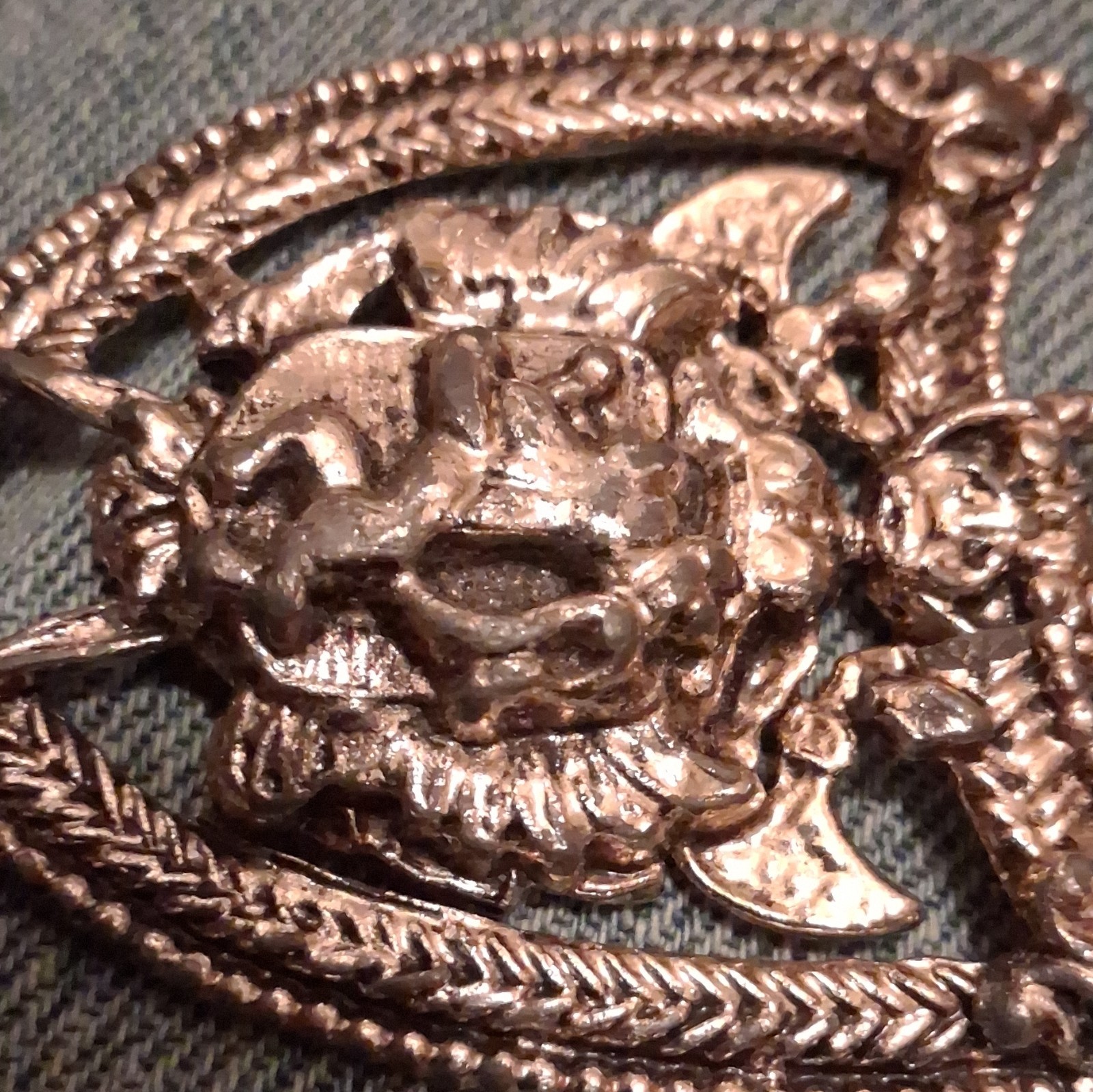 Silver Tone Shield Pin with Raised Animal Head Design, No Stone