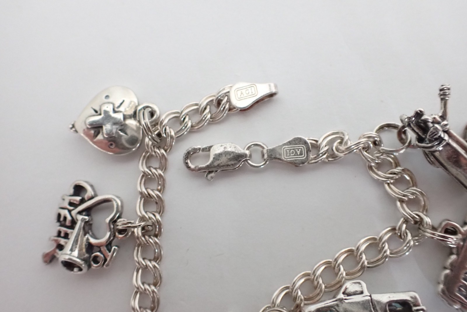 Vintage Sterling Silver AGI Italy Charm Bracelet 7 SJC Charms Monster Truck Golf