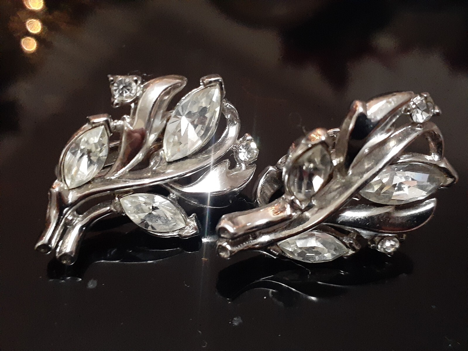 Vintage Crown Trifari rhodium plated marquise cut rhinestone clip on earrings