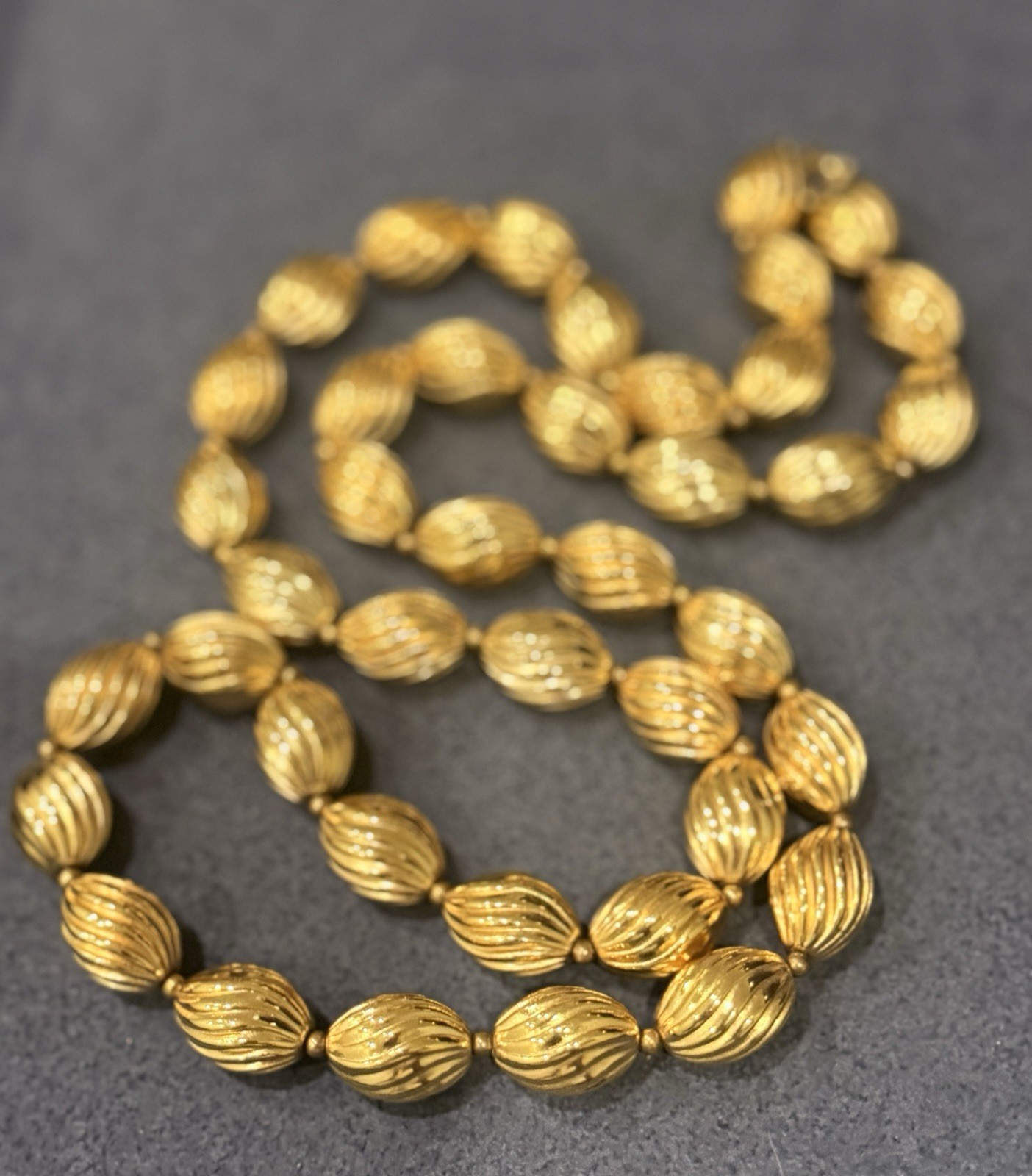 Signed Crown Trifari Vintage Gold Tone Ribbed Oval Bead Opera Long Necklace