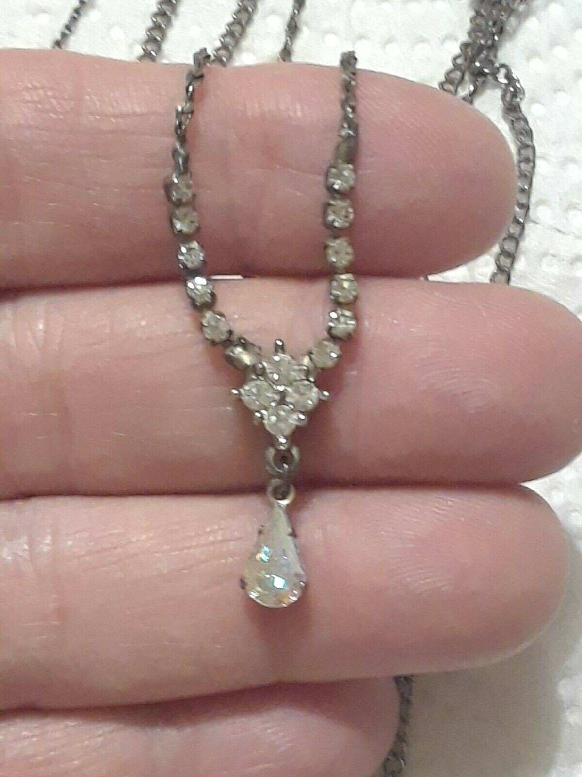 Lot of silver tone chain necklaces with rhinestone pendants. Coin, Love + Luck