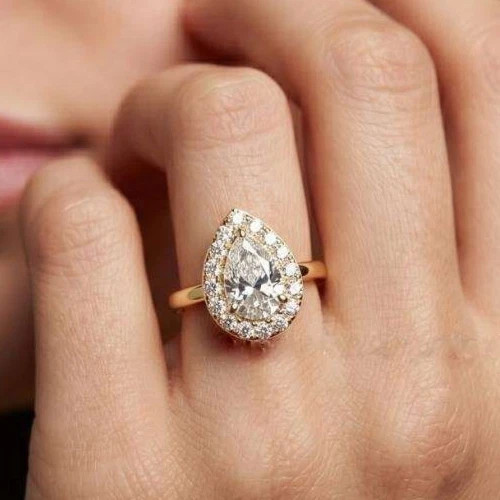 Pear & Round Cut 1.60TCW White Moissanite Halo Wedding Ring In 10K Yellow GoldFN