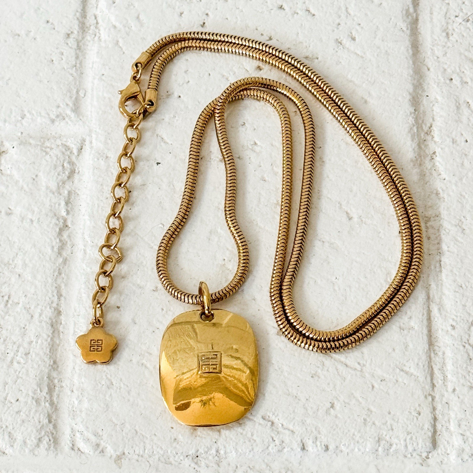 Vintage Givenchy Ave George V Paris Gold Tone Square Logo Pendant Necklace