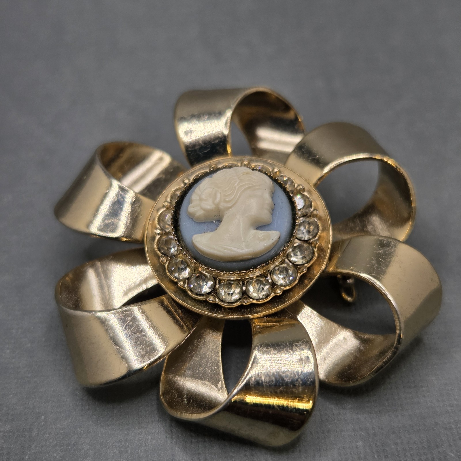 Vintage Unsigned Cameo Brooch Rhinestone Goldtone Flower Ribbon