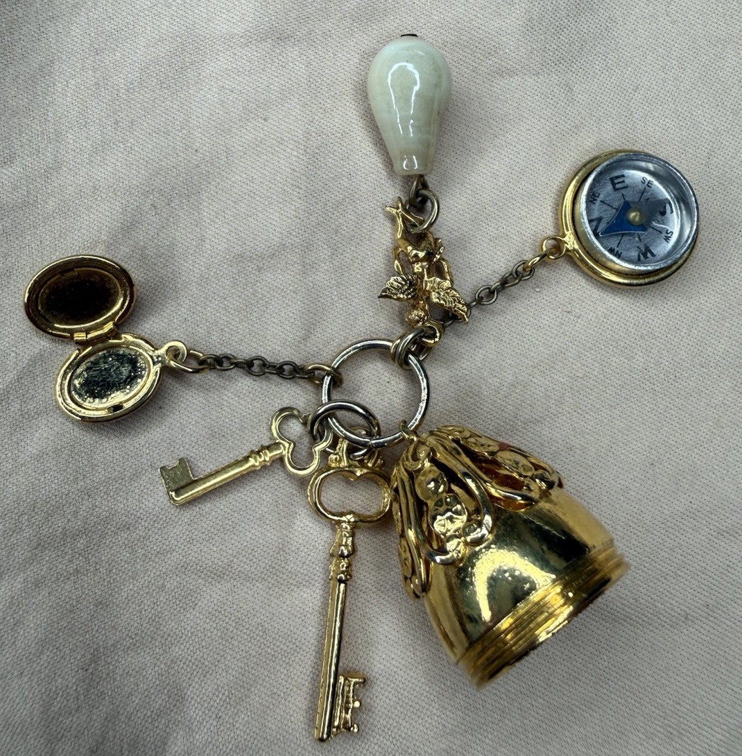 Vintage Multiple Charm Gold Tone Pendant With Some Wear On Gold Tone