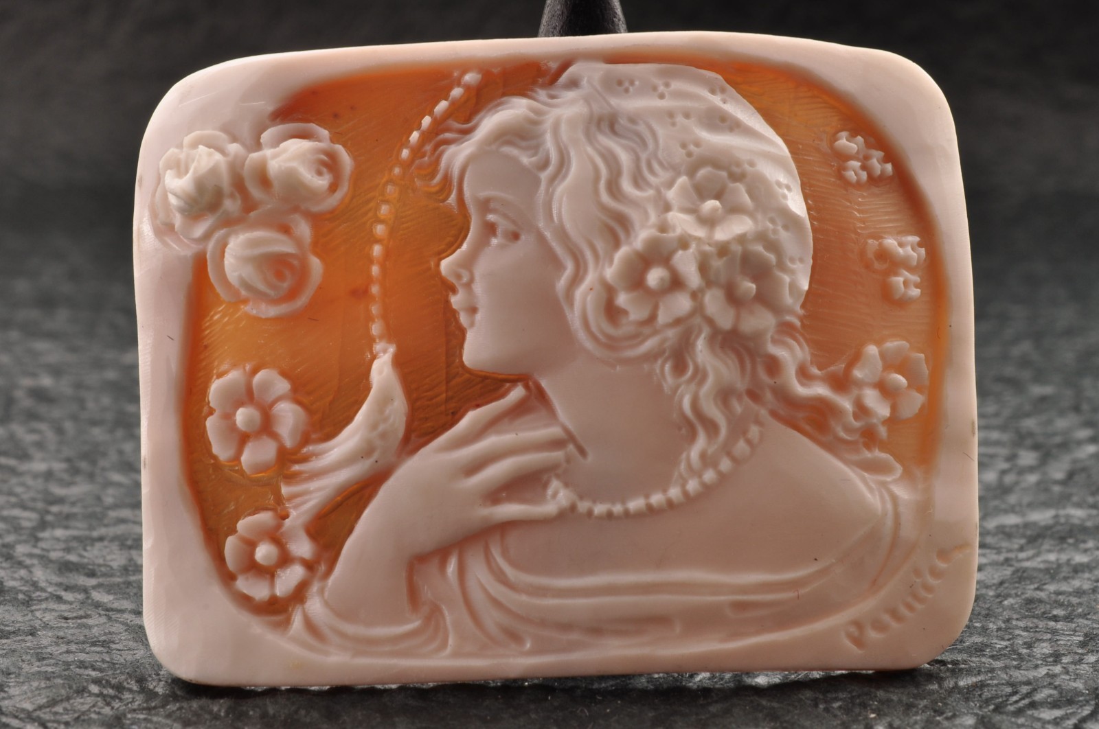Vintage square shell cameo “Girl and little bird” (57.5ct) sign by artist, case.
