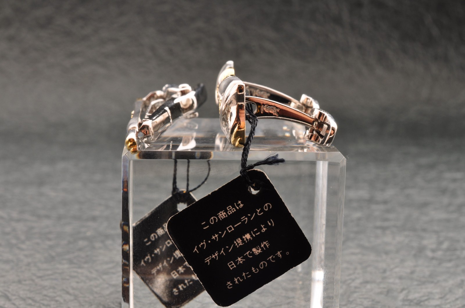 Near mint, gold and Cufflinks and silver tie clip, “Yves Saint Laurent”, case.