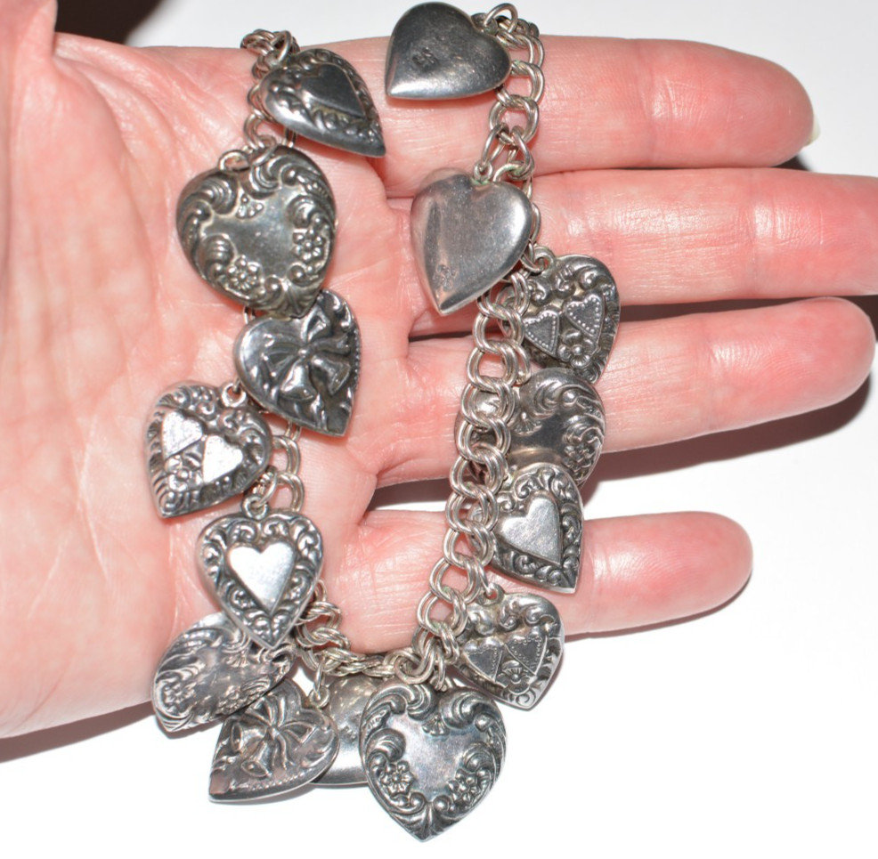 Signed PAJ 925 repousse multiple heart charms necklace 58 grams 24 inches long