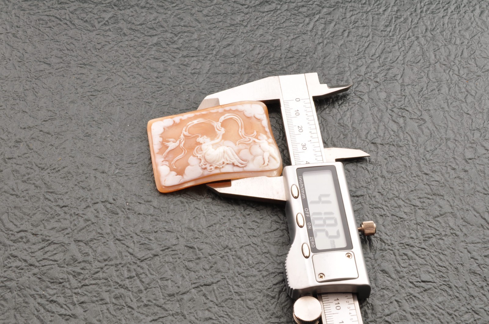 Vintage square shell cameo “Angels and goddesses”, (77.0ct) sign by artist box.