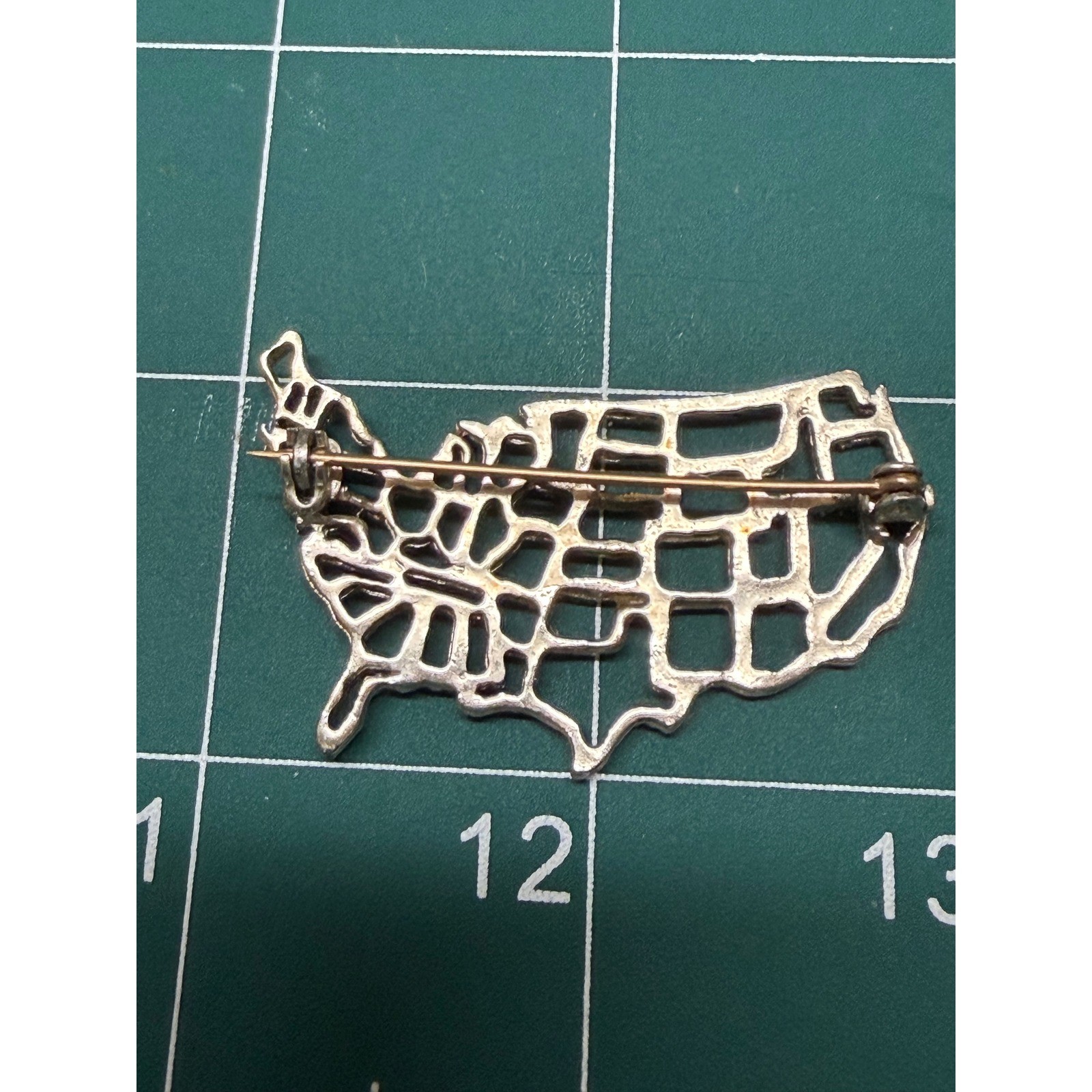 Vintage Goldish Tone USA Map Brooch Blue Rhinestone Patriotic United States Pin