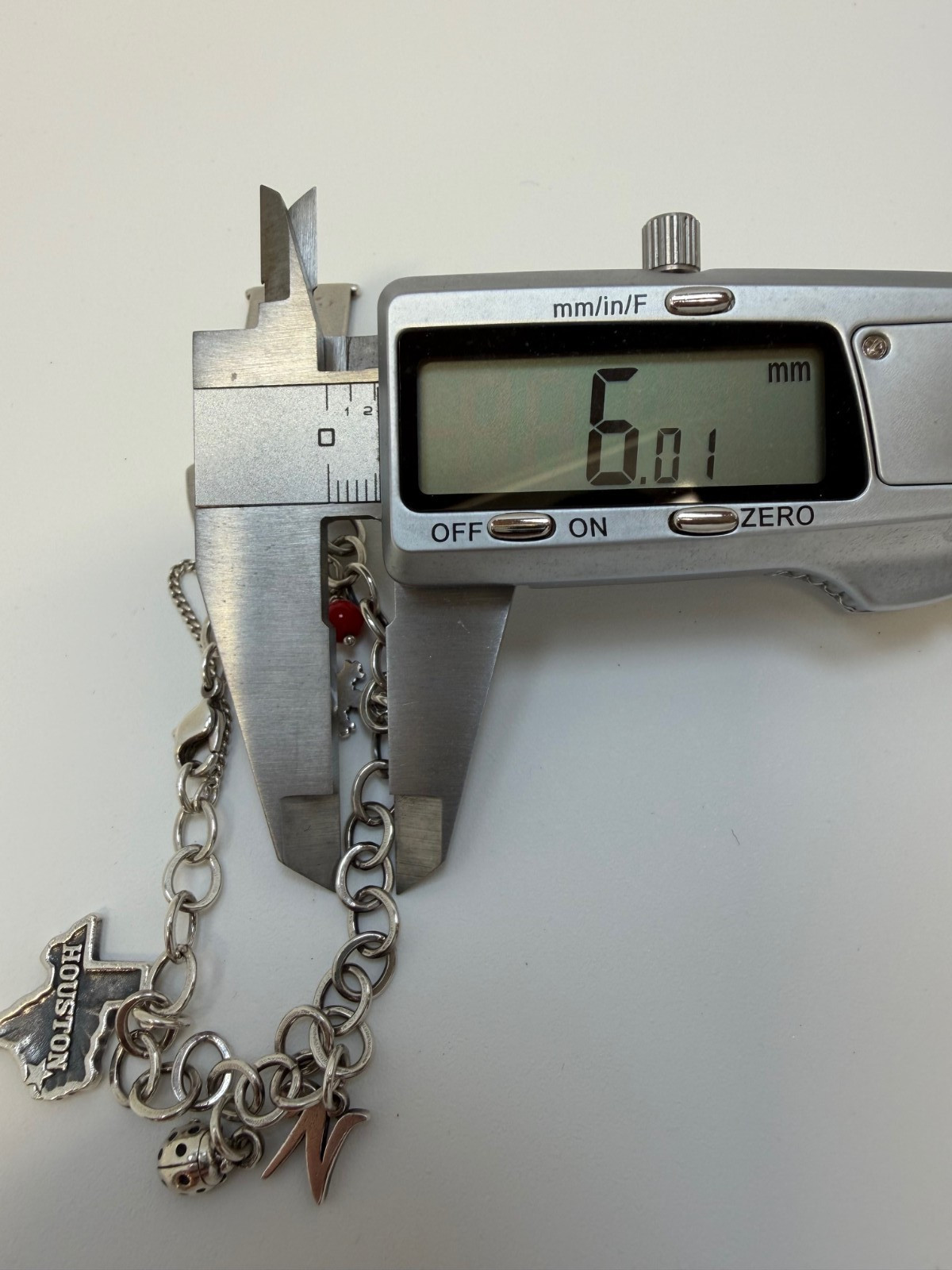 James Avery Sterling silver Charm bracelet with 6 Charms 7.5 Inch. 18+ Grams.