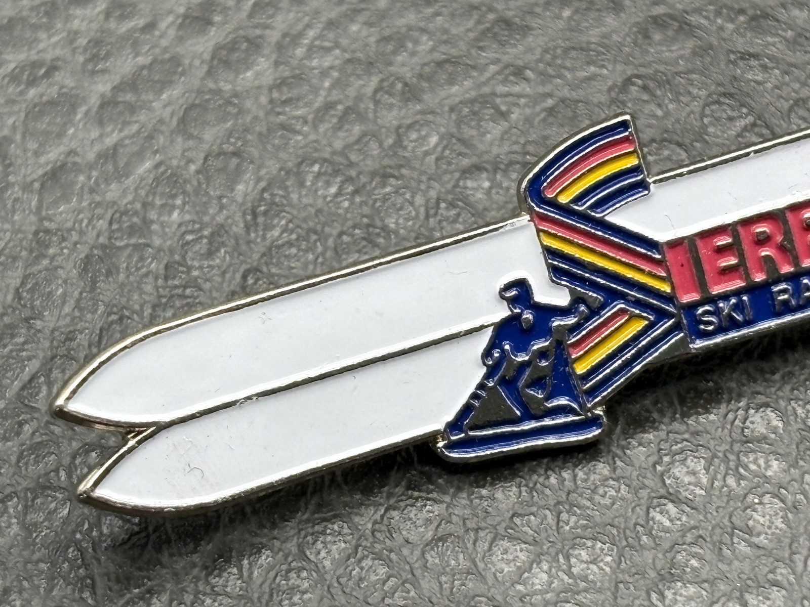 Terra Ski Ranch Vintage Enamel Brooch Lapel Tie Pin Skier Rainbow