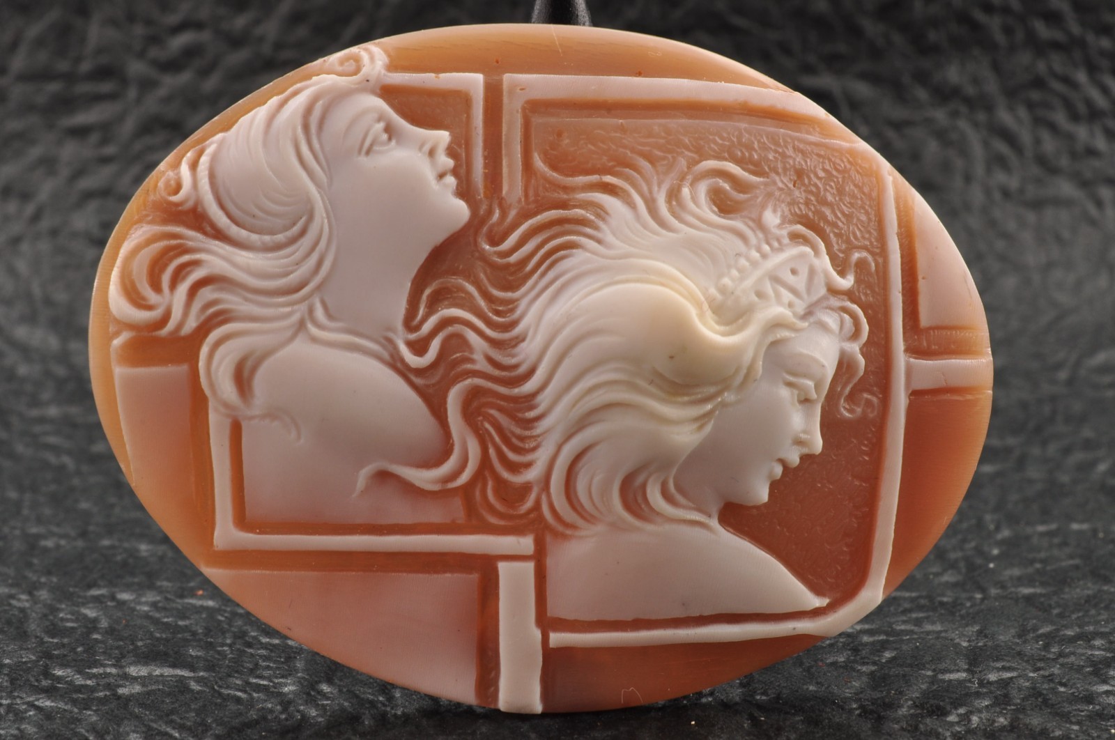 Vintage oval shape shell cameo “Two Girls” (64.0ct), sign by artist with case.