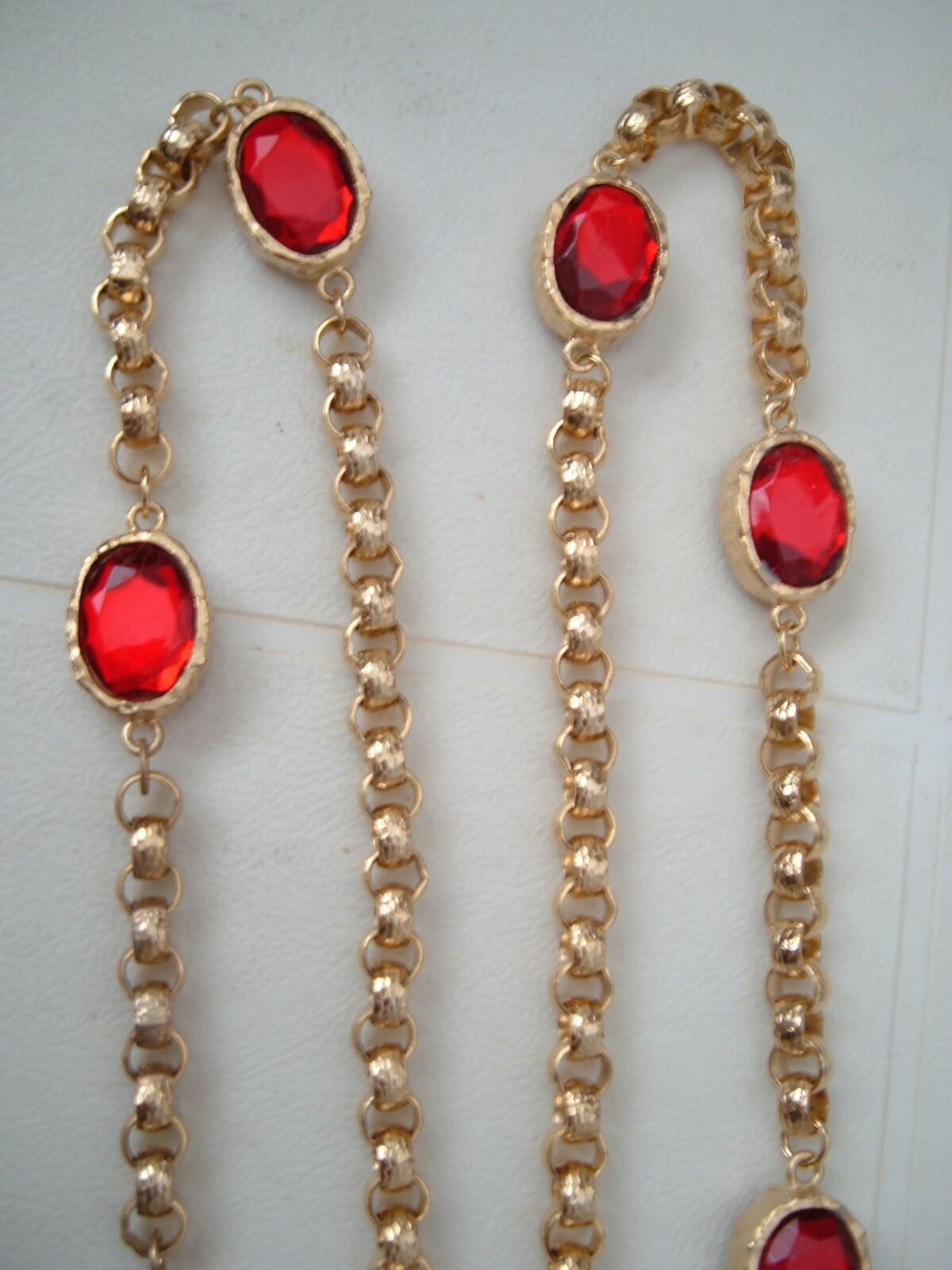 “Unknown” Designer – (Long Gold Tone Crystal Necklace)