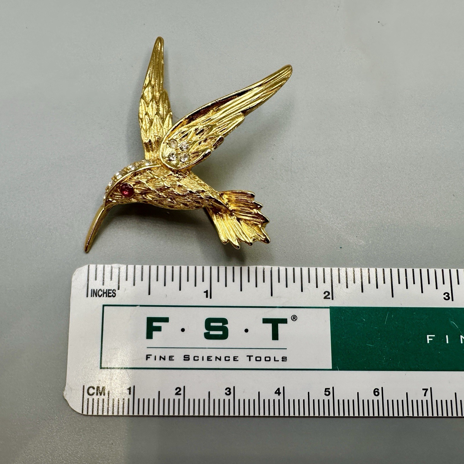 Vintage Hummingbird In Flight Brooch Pin Gold Tone Clear Rhinestones Red Eye 3D