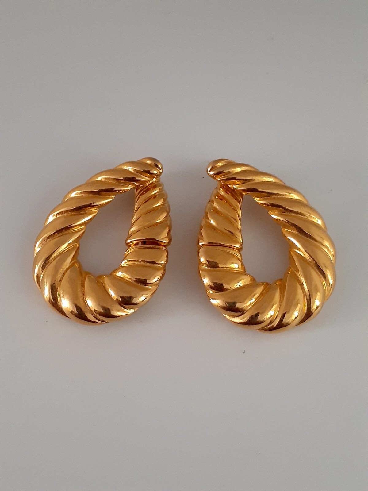 Lancer Gold tone ribbed hoop Huggie Clip on Earrings
