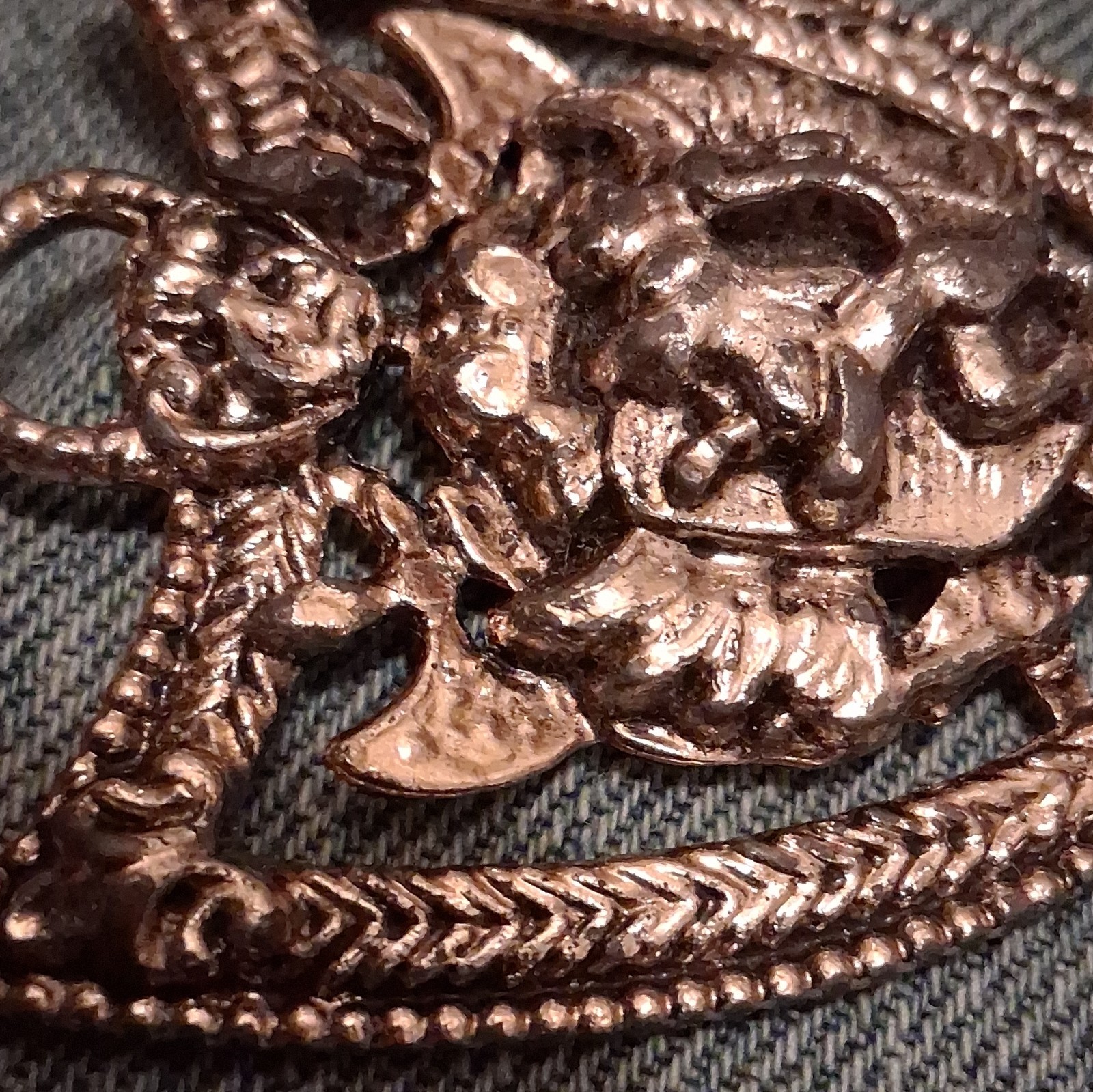 Silver Tone Shield Pin with Raised Animal Head Design, No Stone