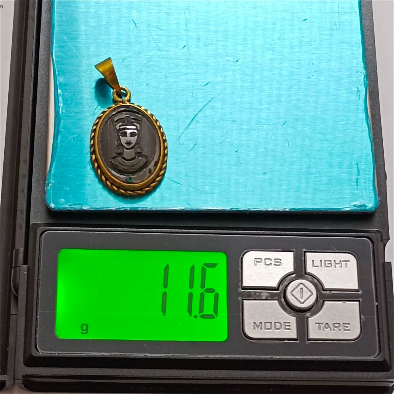 Vintage copper pendant with hematite stone, engraved Egyptian Queen design